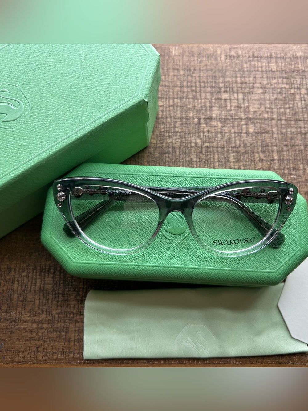New in box Swarovski glasses
